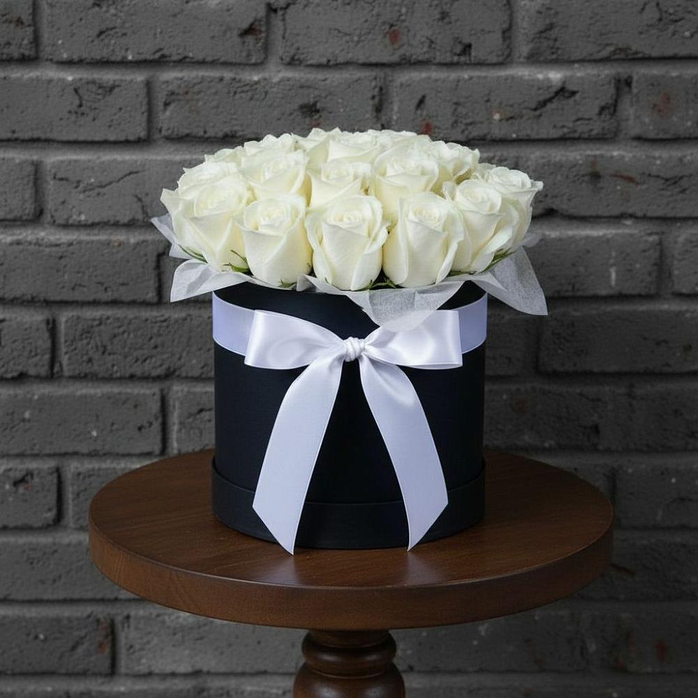 Цветочная композиция из Розы в шляпной коробке в Северном Новосибирской области